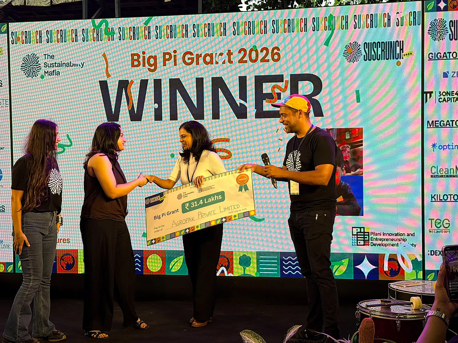Agropak receiving the Big Pi Grant cheque at SusCrunch 2026, Bangalore Creative Circus